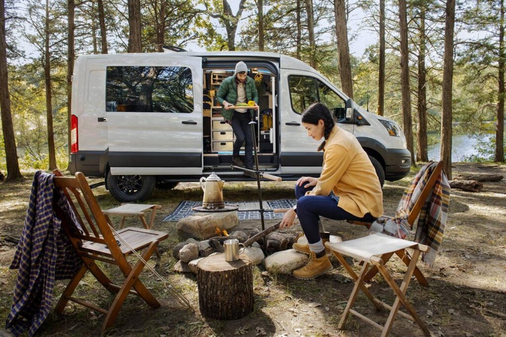 2023-Ford-Transit-Trail-at-campsite-REL-1380x920